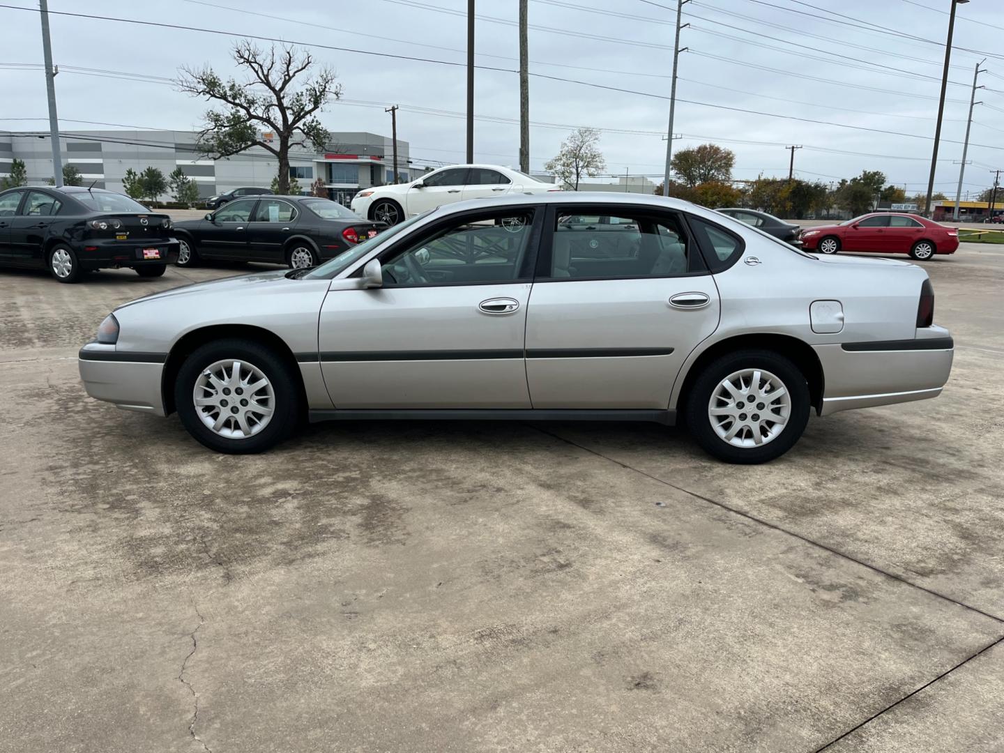 2005 SILVER /gray Chevrolet Impala Base (2G1WF52E459) with an 3.4L V6 OHV 12V engine, 4-Speed Automatic Overdrive transmission, located at 14700 Tomball Parkway 249, Houston, TX, 77086, (281) 444-2200, 29.928619, -95.504074 - Photo#3